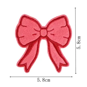 Pink bow embroidery patch, cute fabric iron-on badge for clothing, jackets and DIY decoration.