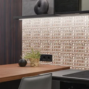 Close-up detail shot of 3D mosaic tile sticker installed on kitchen backsplash wall.