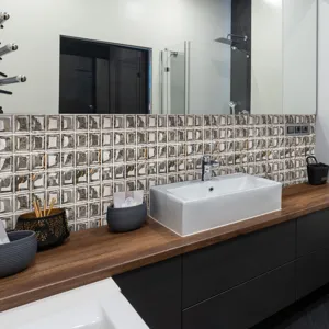 Detail shot of 3D mosaic tile wall sticker, waterproof self-adhesive bathroom decor.