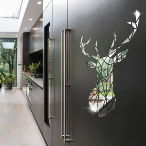 Detail view of a 3D geometric deer head acrylic mirror wall sticker on dark cabinet.