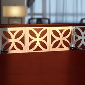Detail shot of 3D mirror decorative sticker featuring a chic clover geometric pattern for home.