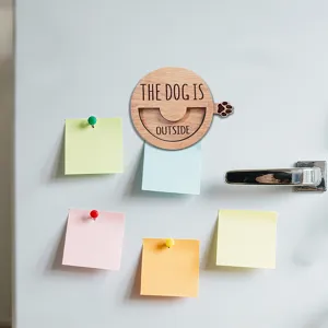 Wooden magnetic pet status sign, rotating indoor outdoor indicator for dog owners on fridge.