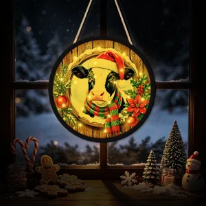 Christmas lighted hanging sign with cow, LED lights, festive window holiday decor detail.