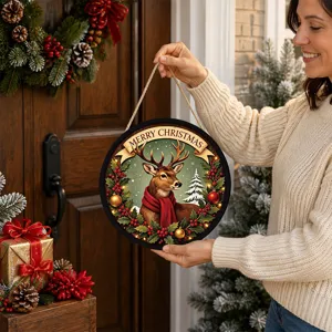 Detailed view of Christmas hanging sign held by woman, featuring deer design and warm lights.