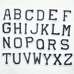 Classic black and white varsity letter embroidery patches, perfect for jacket DIY and repair.
