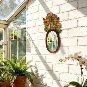 Detailed shot of bohemian style wooden wall mirror featuring a charming mushroom and fern design.