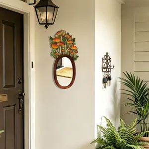 Bohemian style wall mirror featuring mushroom and leaf details, perfect for entryway decor.