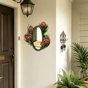 Boho style oval wooden decorative mirror with botanical flower frame, ideal for home wall decor detail.