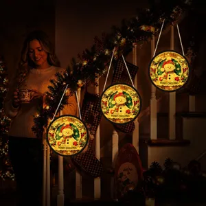 Christmas LED lighted hanging sign with cute snowman design for festive home indoor decor.