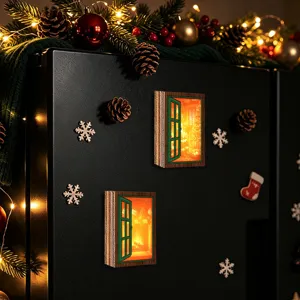 Close-up view of glowing wooden window fridge magnet with miniature Christmas interior scene detail.
