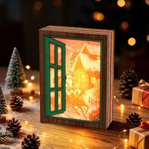 Close-up detail of the glowing Christmas window decoration featuring retro wood frame and lights.