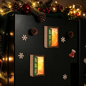 Close-up detail of the glowing wooden window fridge magnet featuring a vintage landscape.