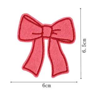 Pink bow embroidered patch for DIY clothing accessories, clothes, hair clips, and crafts.