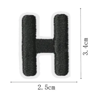 Detail view of the black embroidered letter H patch showing precise dimensions for DIY sewing.