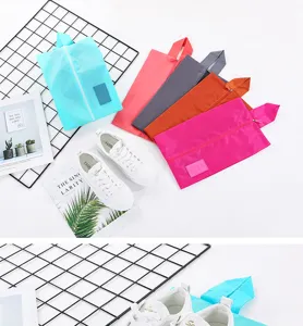 Portable travel shoe bag waterproof oxford cloth storage pouch for sneakers and boots.