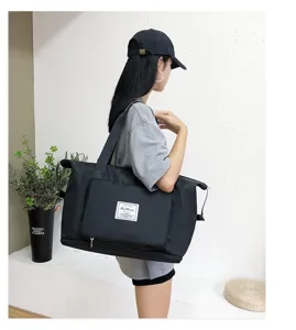 Large capacity black travel duffel bag for sports and fitness, lightweight foldable luggage bag.