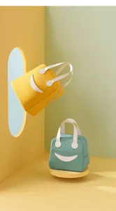 Leuke smiley lunchtas van oxford doek geisoleerde bento handtas voor school details.