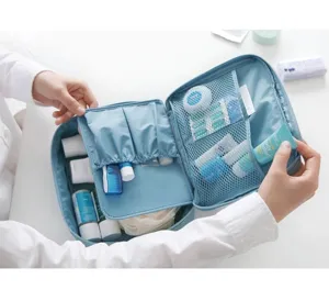 Portable travel toiletry bag with multiple mesh compartments for organized cosmetic storage.