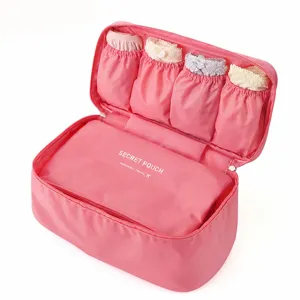 Pink travel underwear storage bag multi-functional portable bra organizer pouch for trips.