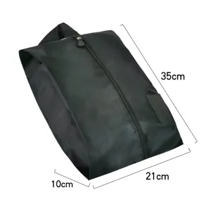 Black waterproof travel shoe bag, portable oxford cloth storage organizer, 35x21x10 cm.