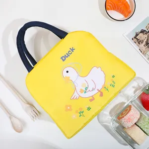 Cute cartoon duck insulated lunch bag, portable waterproof bento handbag for students.