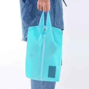 Portable travel shoe storage bag, waterproof oxford cloth sneaker organizer.