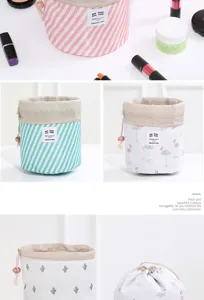 Sac de maquillage cylindrique à cordon, grande capacité trousse cosmétique voyage.