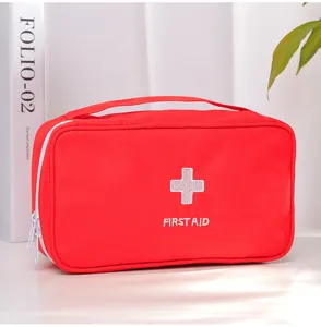 Sac de premiers secours rouge portable en tissu oxford durable, idéal pour les urgences et voyages.
