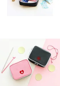 Mini first aid storage bag, cute heart embroidery, durable zipper organizer for travel.