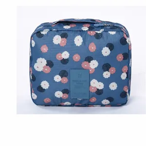 Portable travel cosmetic bag with floral print, waterproof wash bag for storage and trips.