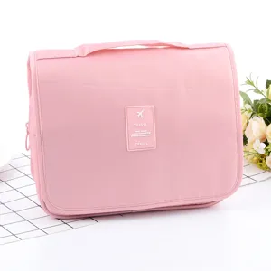 Pink waterproof travel toiletry bag with hook, portable large capacity makeup organizer.