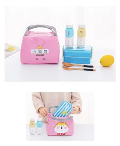 Pink insulated lunch bag with cute cartoon print, portable thermal bento tote box for daily use.