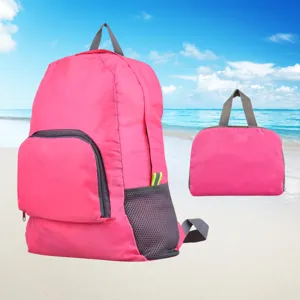 Sac à dos de voyage pliable rose imperméable avec poche filet et pochette de rangement principale