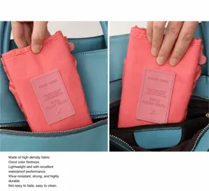 Foldable waterproof travel shoe bag storage pouch in pink nylon for luggage organization