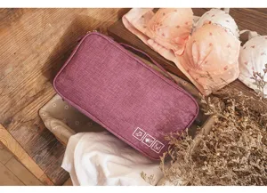Portable travel underwear storage bag multi-functional organizer pouch for bra and panties.