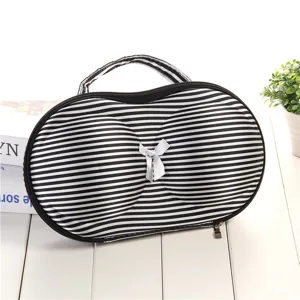 Detail view of black and white striped EVA bra storage box with portable handle and cute bow.