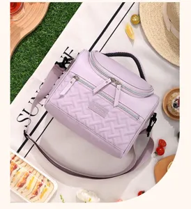 Light purple quilted insulated lunch bag with shoulder strap, picnic cooler bag detail shot.
