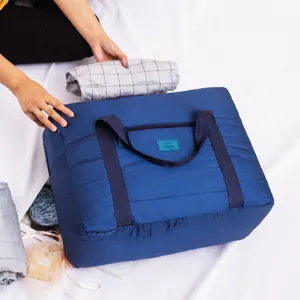 Opvouwbare reistas grote capaciteit bagage organizer voor kleding en schoenen blauw draagbaar.