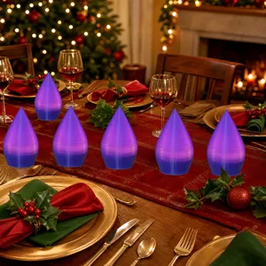 Vista ravvicinata e dettagliata di ornamenti LED luminosi a goccia sulla tavola festiva.