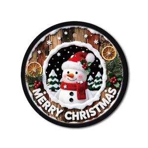 Detailed close-up view of the round Christmas hanging sign featuring a cute snowman design.
