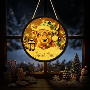 Detail shot of the LED glowing Christmas hanging sign with cute Highland cow for holiday decor.