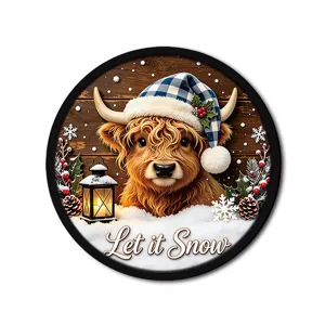 Christmas LED hanging sign detail, cute Highland cow pattern, holiday window decoration.
