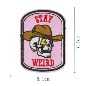 Cool skull cowboy hat embroidered patch with lightning design, stylish clothing badge.