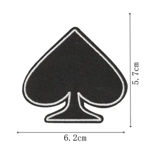 Detailed shot of a black spade embroidered patch with clear white border dimensions 5.7x6.2cm.