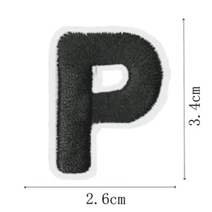 Black letter P embroidery patch for clothing decoration and DIY repair with clean white background.