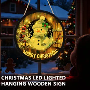 Close-up of LED lighted Christmas wooden hanging sign featuring a cute snowman design.