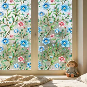 Vista detallada de la película estática decorativa para ventanas con flores de colores.