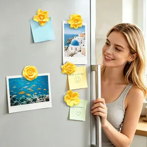 3D decorative floral fridge magnets holding notes and photos on refrigerator door in kitchen scene.
