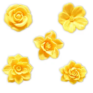 Close-up details of 3D printed yellow flower fridge magnets with vibrant creative floral designs.