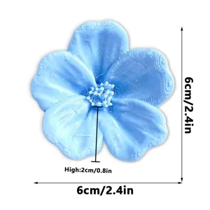 Close-up detail of 3D printed blue flower fridge magnet with size specification.